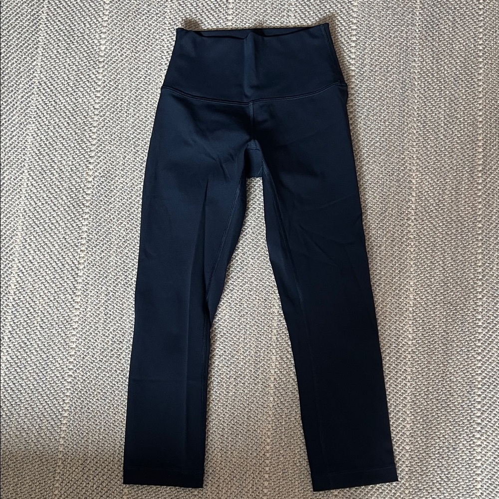 lululemon navy performance leggings with logo tag